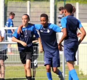 Ikechukwu celebrating with teammates