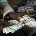 Naira closes at 1,309/$ as banks sell $2.5bn