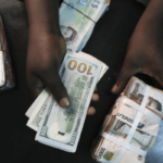 Naira rises, trades below N1,000 per dollar at black market