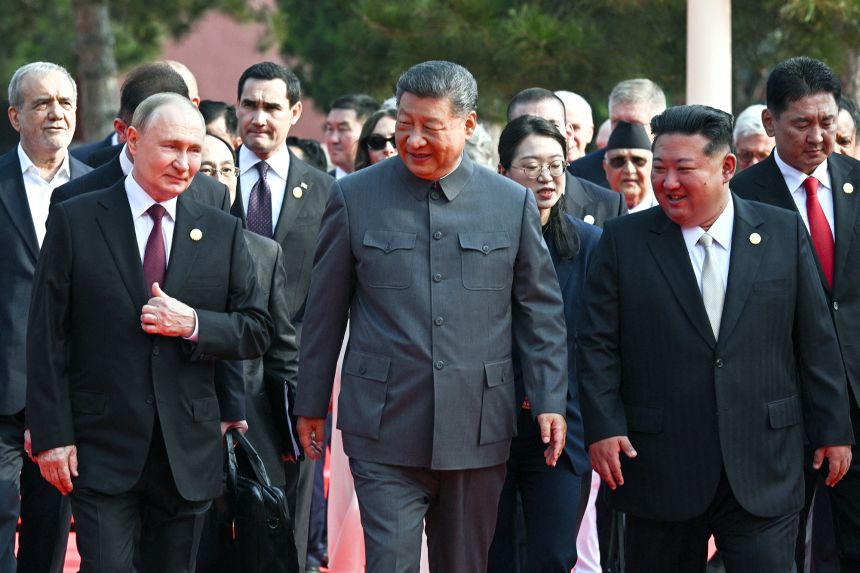 At Beijing parade, Xi and Putin talk immortality and organ transplants